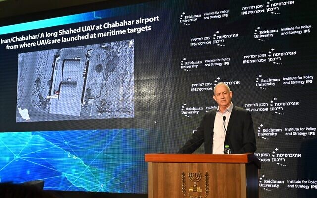 Defense Minister Benny Gantz reveals the location of an alleged Iranian drone base in southern Iran during a speech at Reichman University on November 23, 2021. (Ariel Hermoni/Defense Ministry)