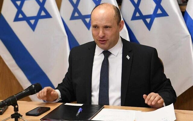 Prime Minister Naftali Bennett holds a video conference with Austrian Chancellor Alexander Schallenberg and Czech Prime Minister Andrej Babic about the COVID-19 pandemic, November 30, 2021. (Amos Ben Gershom/GPO)