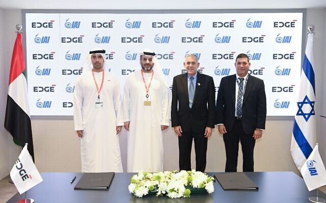 From left, EDGE CEO & Managing Director Faisal Al Bannai, Abu Dhabi Ship Building CEO David Massey, IAI Vice President of Marketing Yehuda Lahav, and IAI President and CEO Boaz Levy stand together at a signing ceremony at the Dubai Air Show on November 18, 2021. (Israel Aerospace Industries)