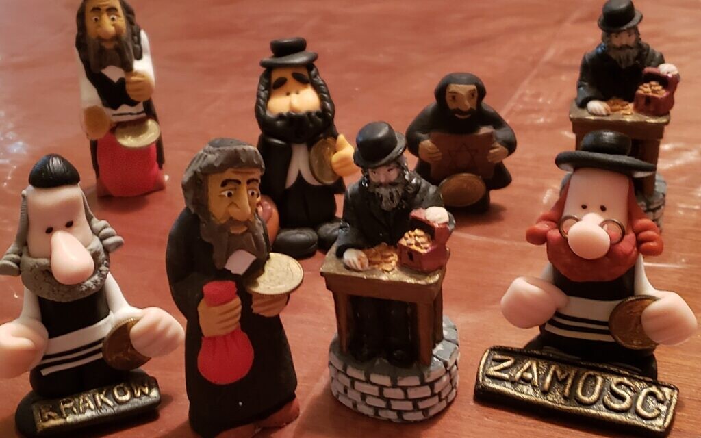 'Lucky Jew Doll' figurines purchased in the Polish cities of Krakow, Warsaw, and Zamosc. (Matt Lebovic/The Times of Israel)