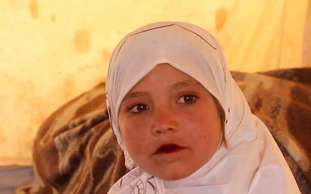 Nine-year-old Parwana, who was sold to a 55-year-old man in Qala-i-Naw, Badghis Province, Afghanistan (Screen grab/CNN)