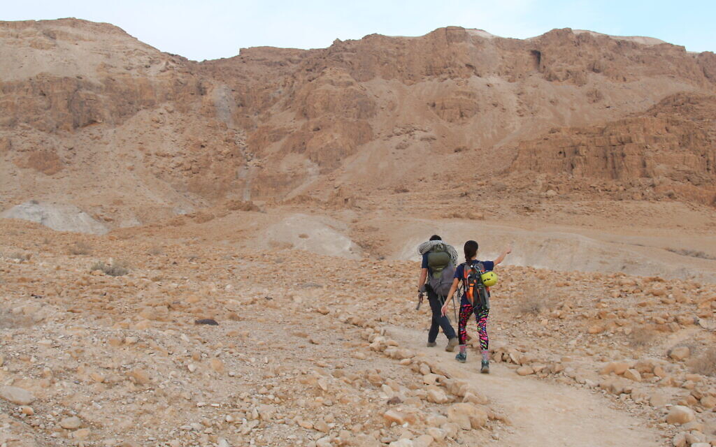 People walking the trail at Qumran National Park. (Shmuel Bar-Am)