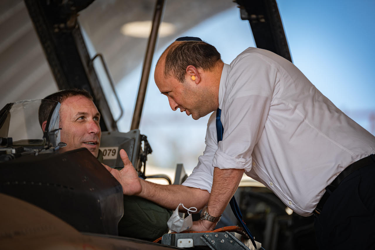 Matan Kahana (left), a former combat pilot and colonel (ret.) in the Israeli Air Force, pictured with his Yamina party leader, Prime Minister Naftali Bennett (Courtesy)