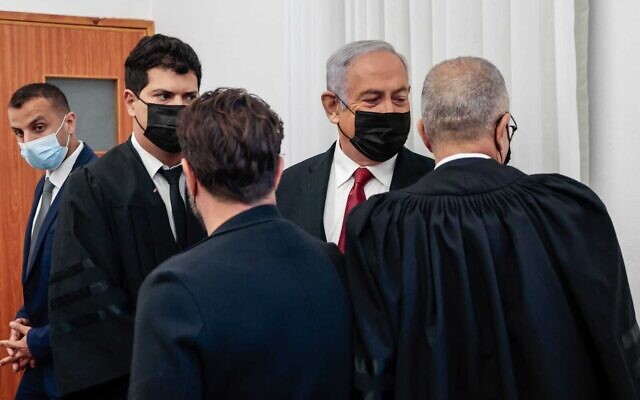 Opposition leader Benjamin Netanyahu at the Jerusalem District Court, November 22, 2021. (Oren Ben Hakoon/Pool)