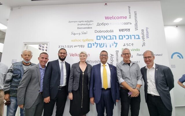 Jerusalem Mayor Moshe Lion (third from right) and other officials at the inauguration of a new immigrant service center in the city on November 2, 2021. (Jerusalem Municipality)