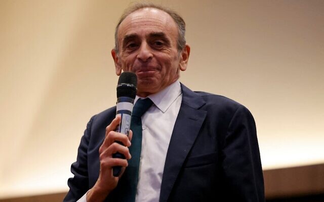 French far-right media pundit Eric Zemmour speaks to members of London's French community at the ILEC Conference Centre in west London, November 19, 2021. (Tolga Akmen/AFP)