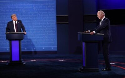 In this file photo taken on September 29, 2020, then-US President Donald Trump and Democratic presidential nominee Joe Biden participate in the first presidential debate at the Health Education Campus of Case Western Reserve University in Cleveland, Ohio. (WIN MCNAMEE / AFP)