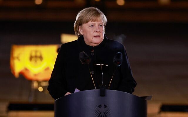 Outgoing German Chancellor Angela Merkel gives a a speech at the defence ministry during the ceremonial send-off for her in Berlin, on December 2, 2021. (Odd Andersen/Pool/AFP)