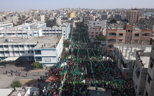 People participate in a rally in the Jabaliya refugee camp in the Gaza Strip, marking the 34th anniversary of the founding of Hamas, which rules the coastal enclave, on December 10, 2021. (Mohammed Abed/AFP)