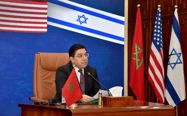 Illustrative: Moroccan Foreign Minister Nasser Bourita takes part in a virtual meeting with his US and Israeli counterparts, at his office in the capital Rabat, on December 22, 2021. (AFP)