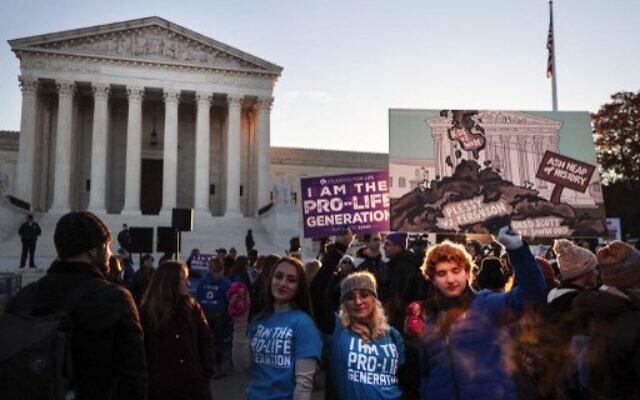 Protesters, demonstrators and activists gather in front of the US Supreme Court as the justices hear arguments in Dobbs v. Jackson Women's Health, a case about a Mississippi law that bans most abortions after 15 weeks, on December 1, 2021 in Washington, DC. (CHIP SOMODEVILLA / GETTY IMAGES NORTH AMERICA / Getty Images via AFP)