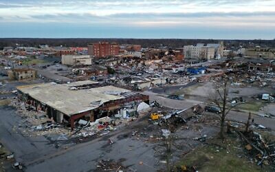 An aerial view of homes and business destroyed by a tornado in Mayfield, Kentucky, on December 11, 2021. (SCOTT OLSON / GETTY IMAGES NORTH AMERICA / Getty Images via AFP)