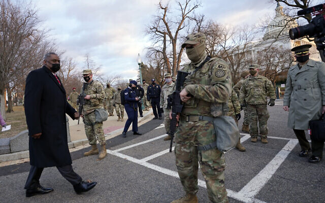 Secretary of Defense Lloyd Austin visits National Guard troops deployed at the US Capitol and its perimeter, January 29, 2021, on Capitol Hill in Washington. (AP Photo/ Manuel Balce Ceneta, Pool)