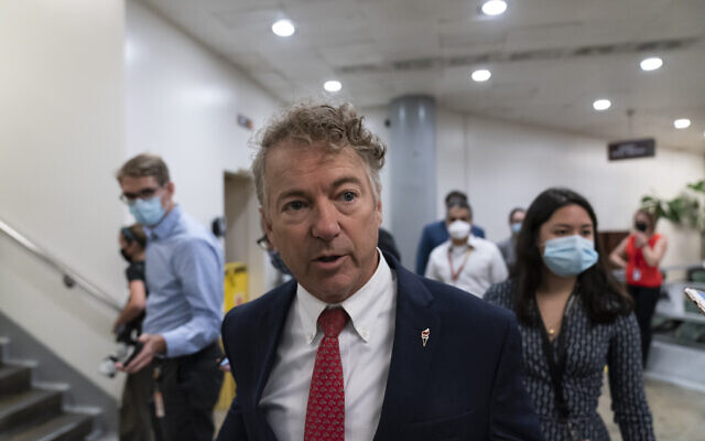 Sen. Rand Paul, R-Ky., speaks with reporters as he walks on Capitol Hill, Thursday, Oct. 7, 2021, in Washington. (AP Photo/Alex Brandon)