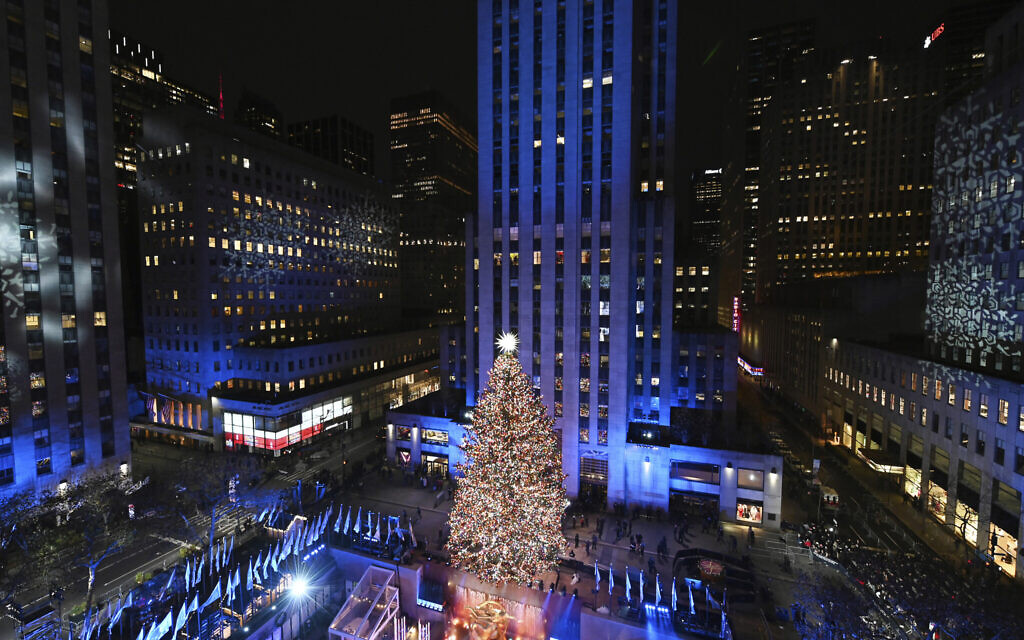 The Rockefeller Center Christmas tree stands lit at Rockefeller Center during the 89th annual Rockefeller Center Christmas tree lighting ceremony, December 1, 2021, in New York. (AP Photo/John Minchillo, File)