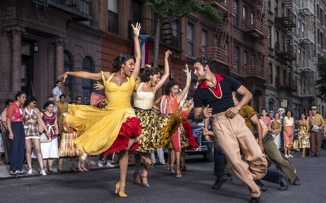 Ariana DeBose as Anita, foreground left, and David Alvarez as Bernardo in 'West Side Story.' (Niko Tavernise/20th Century Studios via AP)