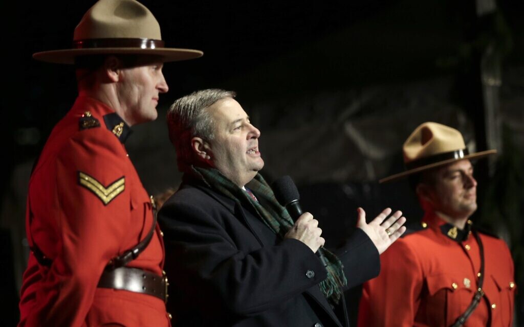 Illustrative: Frank Corbett, the Deputy Premier of Nova Scotia, is flanked by Royal Canadian Mounted Police during the lighting of the City of Boston's Christmas tree in Boston, Thursday, November 29, 2012.  The annual gift by Nova Scotia of the tree is in honor of aid that Boston sent following the 1917 explosion of a munitions ship in Halifax harbor that killed more than 1,600. (AP Photo/Charles Krupa)