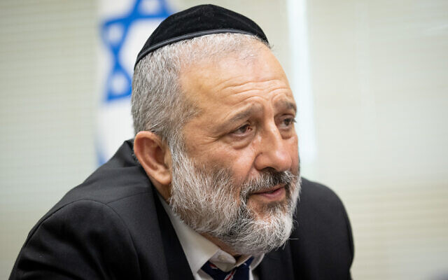 Shas party leader Aryeh Deri leads a faction meeting at the Knesset on July 26, 2021. (Yonatan Sindel/Flash90)
