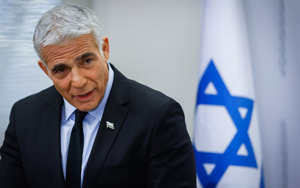 Israeli Foreign Minister and head of the Yesh Atid party Yair Lapid, speaking at a faction meeting in the Knesset, on November 8, 2021. (Olivier Fitoussi/ Flash90)
