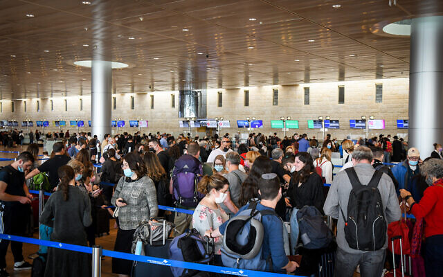 Travelers seen at the Ben Gurion International Airport, on November 29, 2021. (Photo by Flash90 )