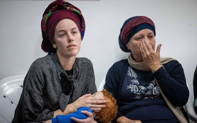 Ettya Dimentman, widow of Yehuda Dimentman, seen during a press conference as she mourns his death in a terror attack, seen at the family home in Mevaseret Zion on December 19, 2021, (Yonatan Sindel /Flash90)