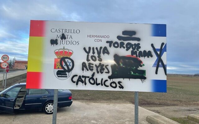A sign in Castilla Mota de Judios was defaced with graffiti restoring the town's name from 1627 to 2015, which translates to Fort Kill the Jews. (Courtesy Lorenzo Gutierrez via JTA)