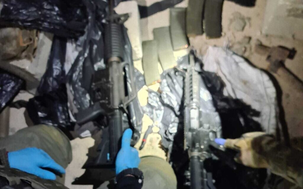 A photo released by the Israel Police on December 19, 2021, shows guns allegedly used in a deadly terror attack near the West Bank outpost of Homesh. (Israel Police)