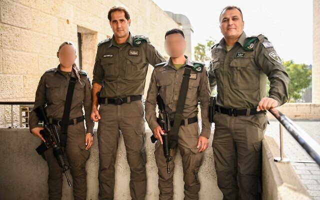 Border Police chief Amir Cohen (R) and the two officers who shot an attacker (faces blurred) in an undated photo (Israel Police spokesperson)