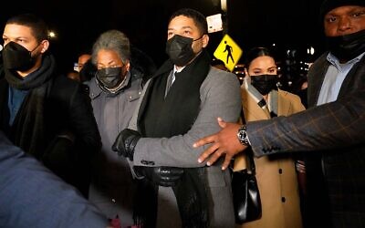 Actor Jussie Smollett, center, along with his mother Janet, second from left, returns to the Leighton Criminal Courthouse in Chicago, Dec. 9, 2021.(Nam Y. Huh/AP)