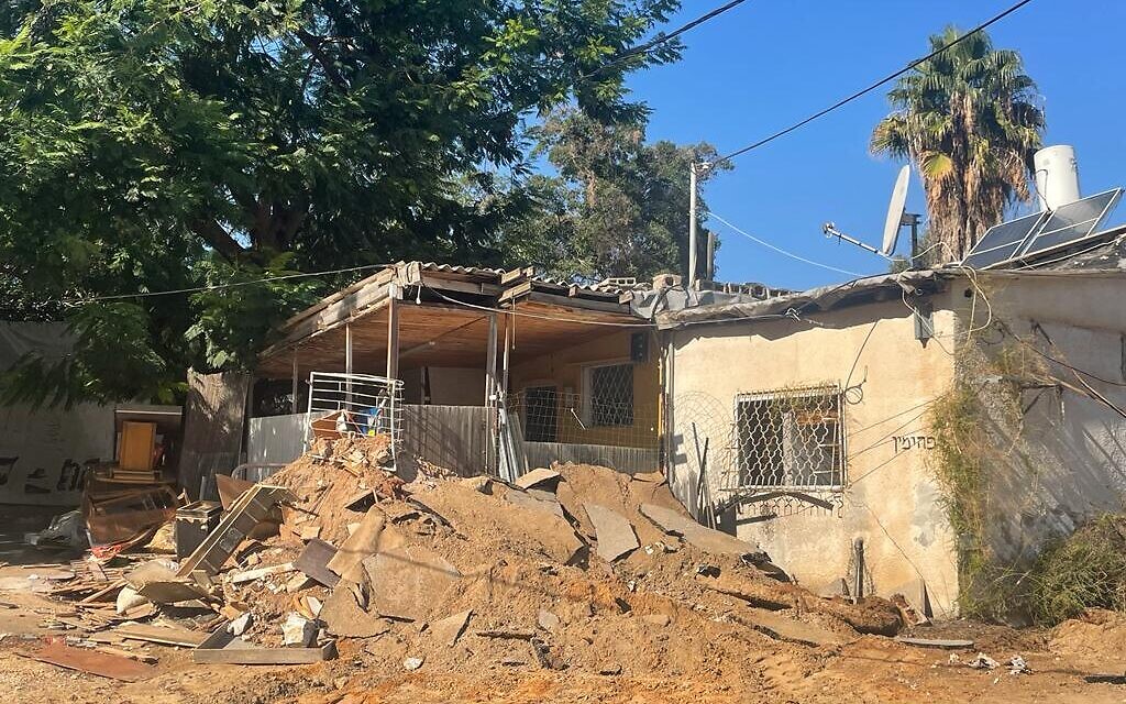 Piled garbage outside of a Givat Amal home, on November 23, 2021. (Carrie Keller-Lynn/Times of Israel)