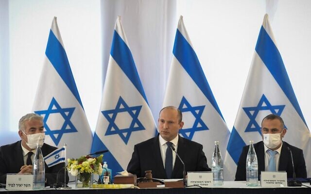Prime Minister Naftali Bennett speaks during a cabinet meeting held on the Golan Heights on December 26, 2021. (Kobi Gideon/GPO)