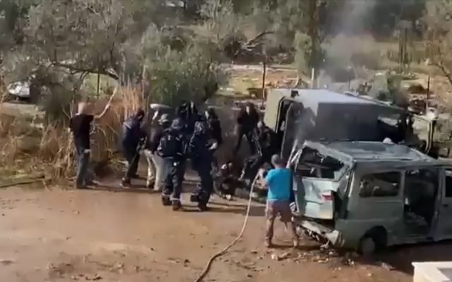 Cast and crew filming the fourth season of the action drama 'Fauda' in Kafr Qasim, December 2021 (Channel 13 screenshot)