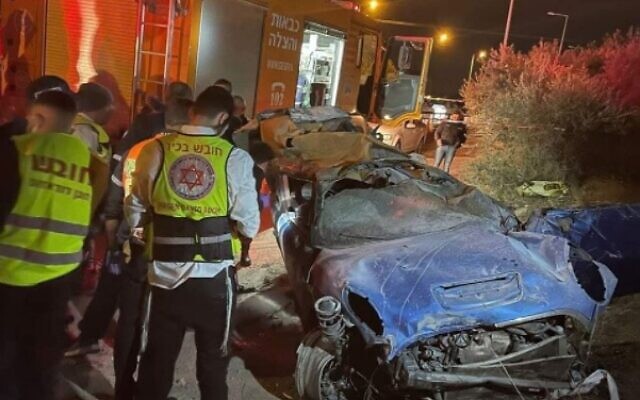 Paramedics at the site of a deadly car crash near Haifa, on December 4, 2021 (Magen David Adom)