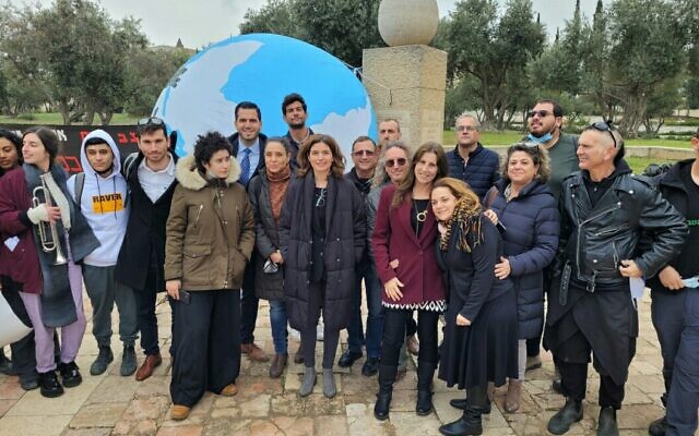 Environmental Protection Minister Tamar Zandberg is flanked by some of the many opponents to the Europe Asia Pipeline Company's deal to transfer Gulf oil, outside the High Court in Jerusalem, on December 23, 2021. (Dov Greenblat, Society for the Protection of Nature in Israel)
