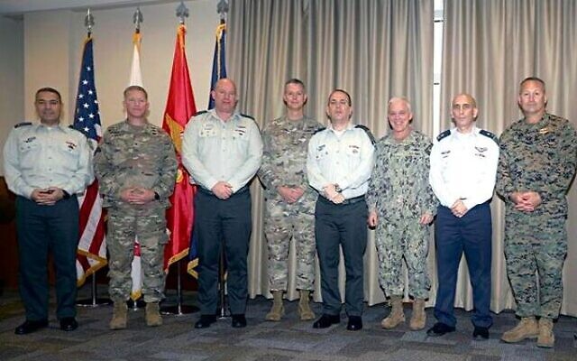 Senior Israel Defense Forces officers (in white) meet with top officials in the US military's Central Command in Tampa, Florida, on December 1, 2021. (Israel Defense Forces)