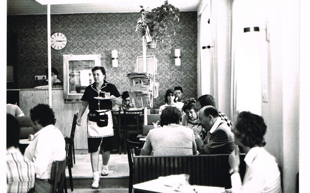 A waitress at Cafe Alaska, from 'Nes or Turkish,' an exhibit about Jerusalem's early coffeehouses at Tmol Shilshom cafe in Jerusalem until December 31, 2021 (Courtesy private collection)