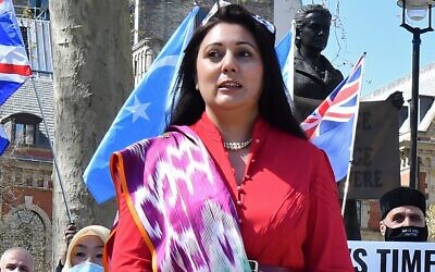 British Conservative Party MP Nusrat Ghani joins members of the Uyghur community as they demonstrate to call on the British parliament to vote to recognize alleged persecution of China's Muslim minority Uyghur people as genocide and crimes against humanity in London, April 22, 2021. (JUSTIN TALLIS / AFP)
