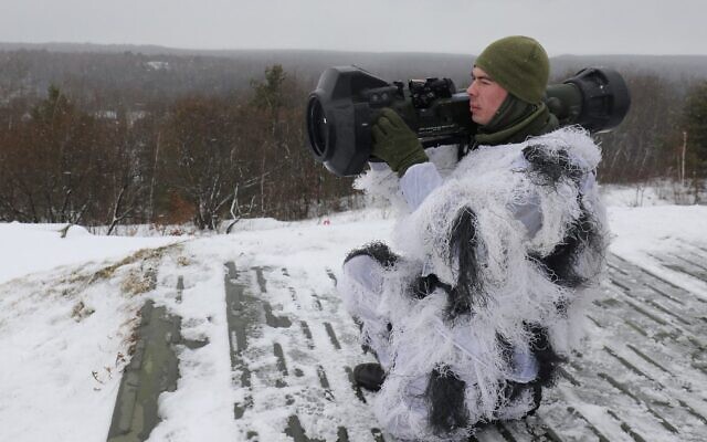A Ukrainian serviceman aims an NLAW missile launcher during a drill at the firing ground of the International Center for Peacekeeping and Security, near the western Ukrainian city of Lviv, on January 28, 2022. (AFP) A Ukrainian serviceman aims an NLAW missile launcher during a drill at the firing ground of the International Center for Peacekeeping and Security, near the western Ukrainian city of Lviv, on January 28, 2022. (AFP)