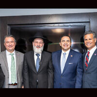 The inauguration of the Congressional Caucus for the Advancement of Torah Values was attended by (left ot right) Reps. Kat Cammack (R-FL); Don Bacon (R-NE); Rabbi Dovid Hofstedter; Henry Cuellar (D-TX); Dan Meuser (R-PA); and Brian Fitzpatrick (R-PA) in Washington, D.C. (Sruly Saftlas/CNW Group/Dirshu via JTA)