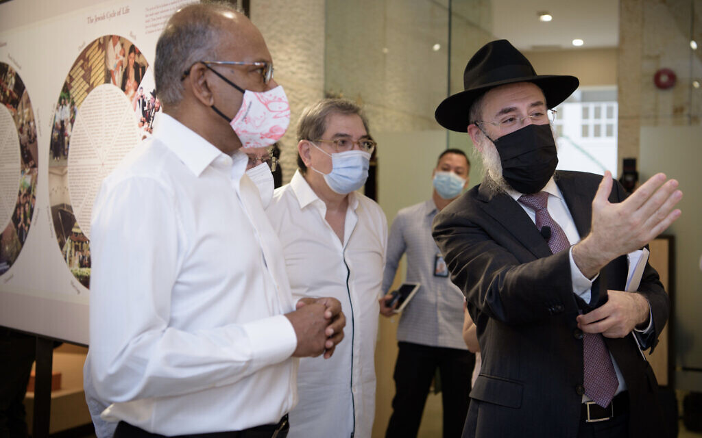 Singapore’s Minister for Home Affairs and Minister for Law K. Shanmugam tours the museum with Nash Benjamin, center, the president of Singapore’s Jewish Welfare Board, and the Chief Rabbi of Singapore Mordechai Abergel. (Jewish Welfare Board of Singapre/ via JTA)