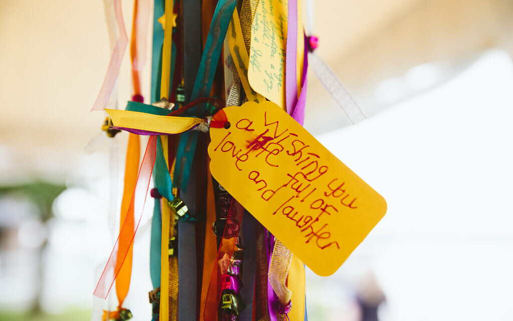 The huppah at the wedding of Ben and Julie Schreiber was affixed with blessings submitted by their guests. (JennyGG Photography/ via JTA)