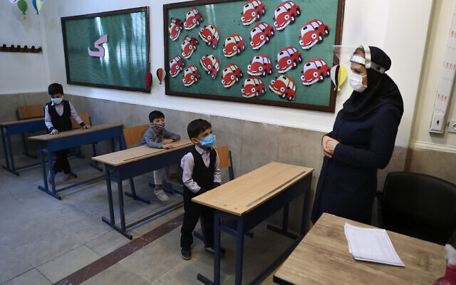Illustrative: Students and their teacher at the Hashtroudi school in Tehran, Iran, Saturday, Sept. 5, 2020. (AP Photo/Vahid Salemi)