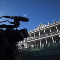 A camera directed on Palais Coburg, where closed-door nuclear talks take place in Vienna, Austria, on December 17, 2021. (AP Photo/Michael Gruber)
