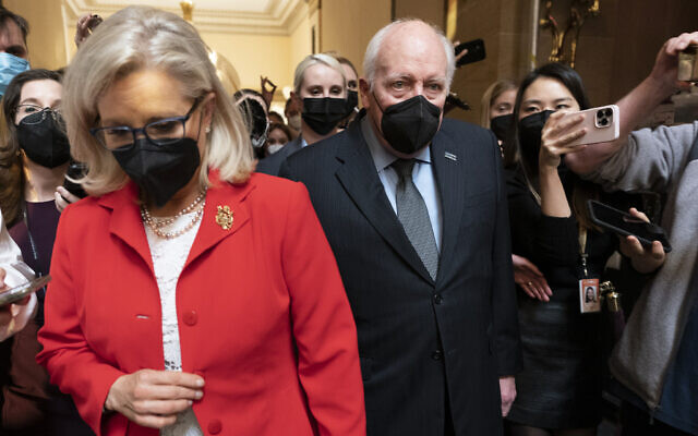 Former US vice [resident Dick Cheney walks with his daughter, Republican Representative Liz Cheney of Wyoming, in the Capitol Rotunda at the US Capitol in Washington, January 6, 2022. (AP Photo/Manuel Balce Ceneta)