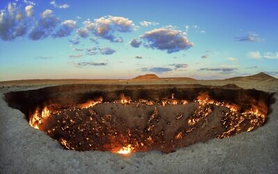 The crater fire named 'Gates of Hell' is seen near Darvaza, Turkmenistan, July 11, 2020. (AP Photo/Alexander Vershinin)