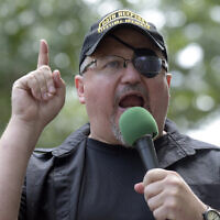 In this file photo from June 25, 2017, Stewart Rhodes, founder of the Oath Keepers, speaks during a rally outside the White House in Washington, DC. (AP Photo/Susan Walsh, File)