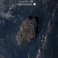 Satellite image taken by Himawari-8, a Japanese weather satellite operated by Japan Meteorological Agency and released by National Institute of Information and Communications Technology (NICT), shows an undersea volcano eruption at the Pacific nation of Tonga Saturday, Jan. 15, 2022. (NICT via AP)