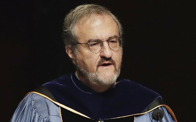 In this photo from January 30, 2017, University of Michigan President Mark Schlissel speaks during a ceremony at the university, in Ann Arbor, Michigan. (AP Photo/Carlos Osorio, File)