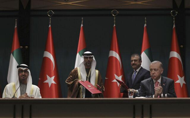 Turkey's President Recep Tayyip Erdogan, right, and Sheikh Mohammed bin Zayed Al Nahyan, left, the Crown Prince of the United Arab Emirates attend a signing ceremony at the presidential palace, in Ankara, Turkey, Wednesday, Nov. 24, 2021. (AP Photo/Burhan Ozbilici)