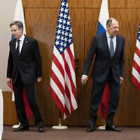 US Secretary of State Antony Blinken (left) and Russian Foreign Minister Sergey Lavrov move to their seats before their meeting, on Friday, January 21, 2022, in Geneva, Switzerland. (AP Photo/Alex Brandon, Pool)
